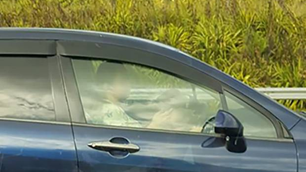 Woman caught texting while child drives 