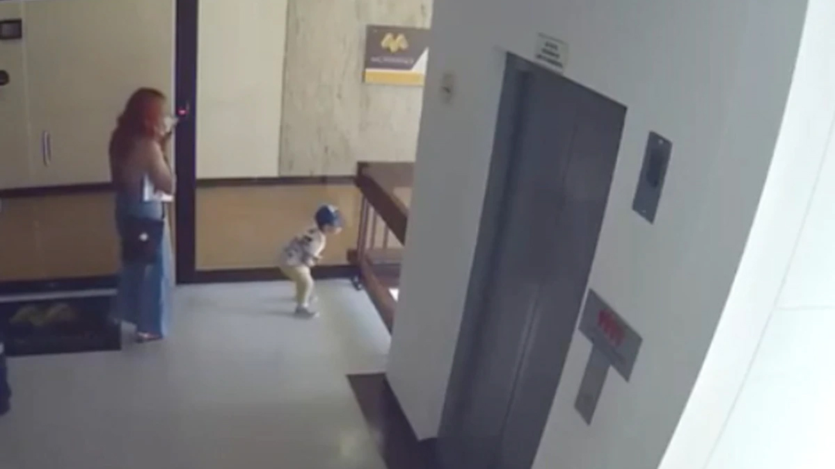 Watch the incredible moment a mum saves her toddler from falling off a balcony