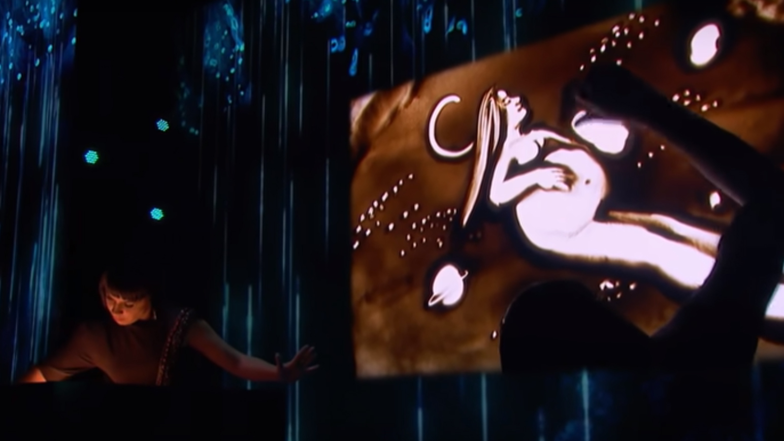 Woman tells heartbreaking story through MESMERISING sand art routine on America's Got Talent