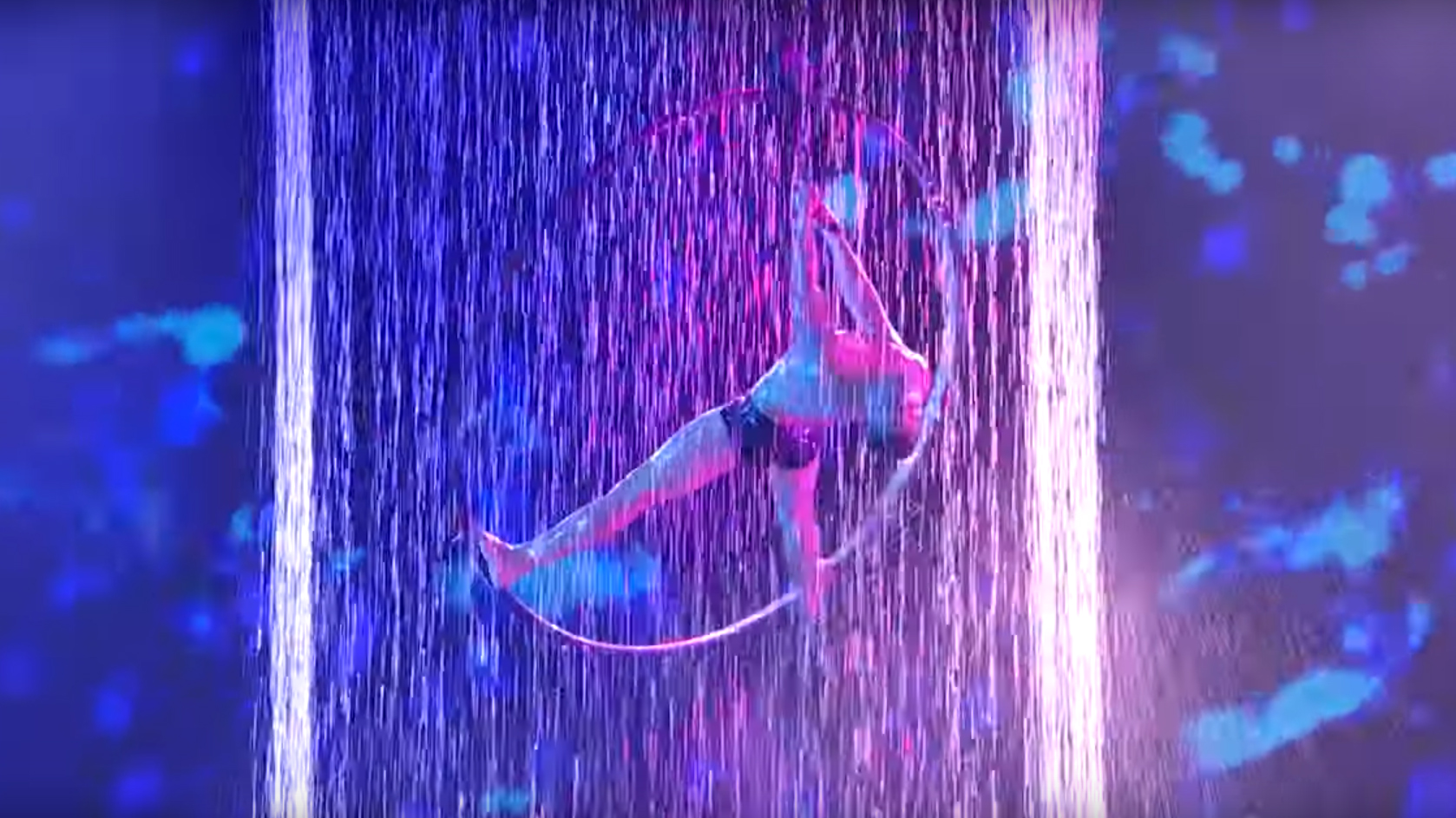 Hoop aerialist wows with incredible acrobatic routine in water on America's Got Talent