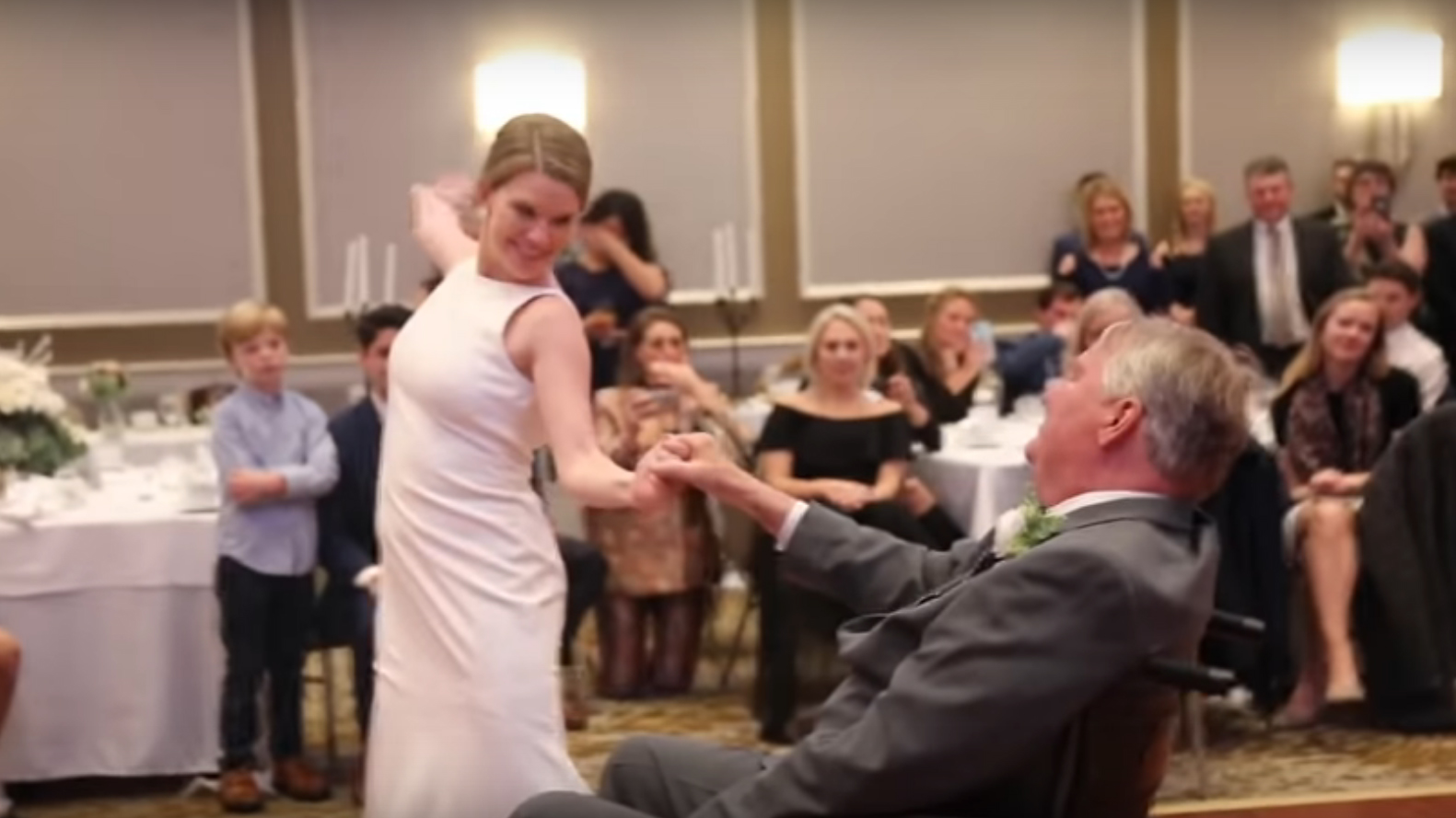 This bride's emotional dance with her terminally ill father in a wheelchair gave us all the feels!