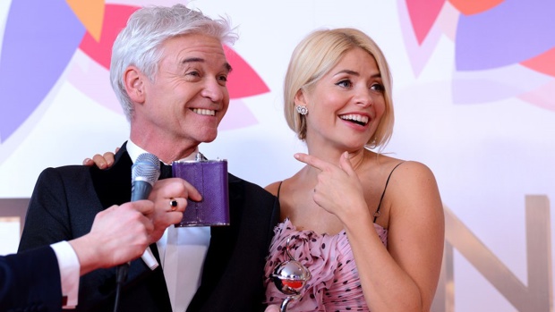 Holly Willoughby and Phillip Schofield pose with the Daytime Award in the winners room during the National Television Awards. Getty Images