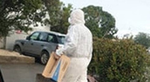 Cautious Shopper wears everything BUT gloves to protect himself from Coronavirus
