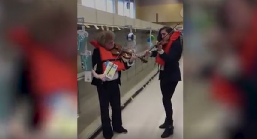 WATCH: Violinists perform a titanic style supermarket concert amoung the empty toilet paper isle