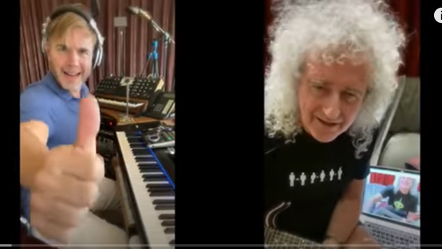 Brian May and Gary Barlow performing together, while not together! 