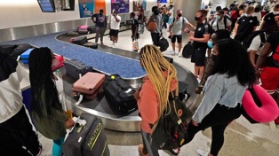 Are your bags on the carousel? Air New Zealand's app wants to give clarity to customers where their luggage is. Photo / Wilfredo Lee via NZ Herald