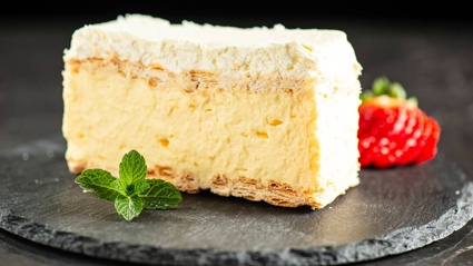 Turns out there's an easy trick to cutting a custard slice neatly. Photo / Getty Images