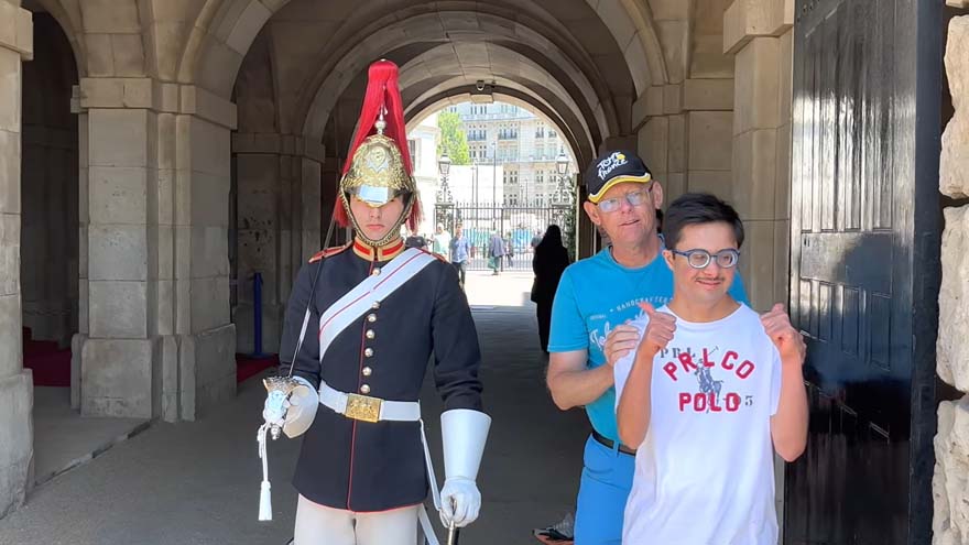 King's Guard melts hearts by breaking protocol so boy with Down syndrome can have a photo taken with him