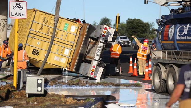 Puddles of glue from the truck spill onto the berm and the road. Photo / Michael Craig.