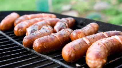 Butchers battle it out to see who stuffs the quintessential sausage and who snags the win. Photo / 123RF