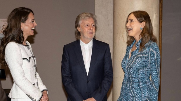 Kate was in a fit of giggles after meeting the former Beatles singer and his wife Nancy. Photo / Getty Images