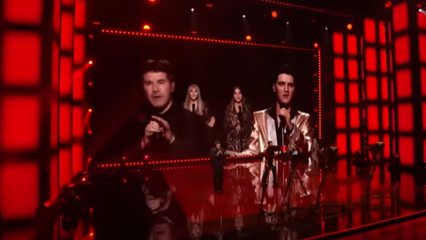 The sensational moment Simon Cowell joins "Elvis Presley" on stage to sing 'You're The Devil In Disguise'