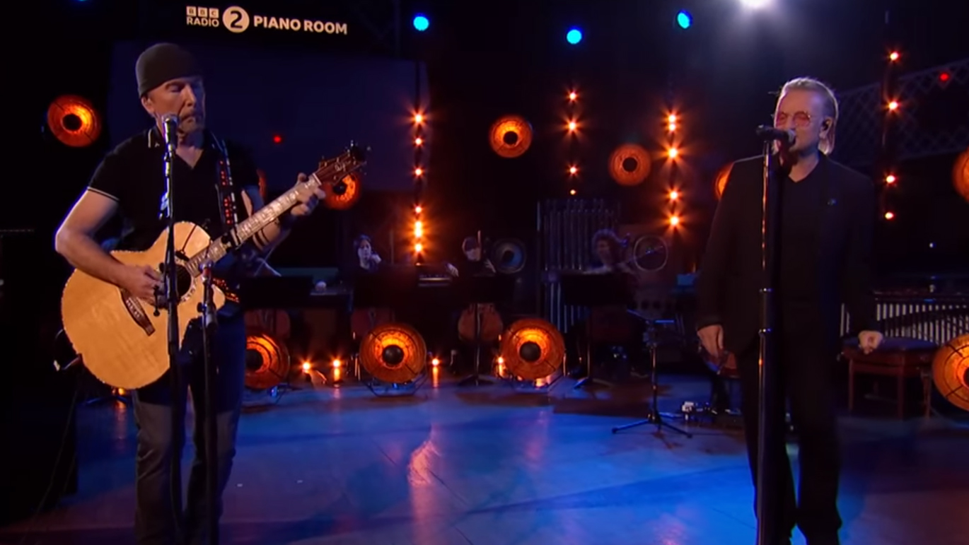 U2's Bono and The Edge perform hauntingly beautiful orchestral cover of ABBA's 'S.O.S'