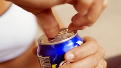 The design of soft drink cans means there's an easier way to open them than using your fingers to pop the tab. Photo / Getty Images