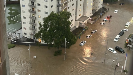 Wild weather: A person has died in floodwaters, motorways blocked, Auckland airport evacuated