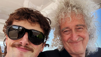 Watch Sir Brian May & Benson Boone perform Bohemian Rhapsody