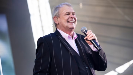 John Farnham is officially a grandfather