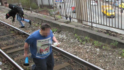 Moment Hero Stranger Jumps Onto Railway Tracks To Save Labrador