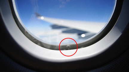 So THAT'S Why Plane Windows Have Holes!