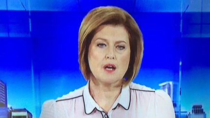 Newsreader's Blouse Creates Unfortunate Illusion