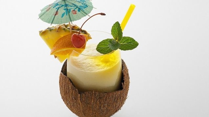 Pop open a tiny paper umbrella ... it's Piña Colada Day!