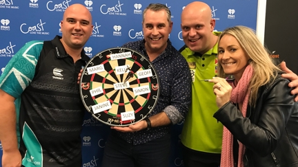 Jase freaks out as Darts Masters Michael Van Gerwen and Rob Cross throw darts at his face