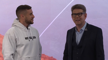 The adorable moment TVNZ's John Campbell fanboys over All Black TJ Perenara after surprise visit