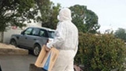 Cautious Shopper wears everything BUT gloves to protect himself from Coronavirus