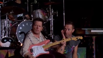 Michael J. Fox makes surprise appearance with Coldplay at Glastonbury