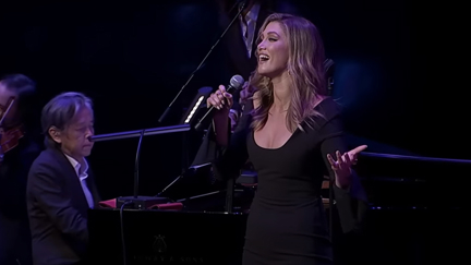 Delta Goodrem stuns with emotional Olivia Newton-John medley at the late singer's state memorial