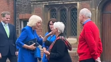 Queen Camilla ignores royal tradition to give warm greeting to friend Dame Judi Dench